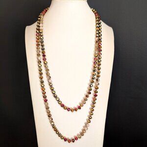 Long, single strand multi color metallic faceted glass bead necklace
